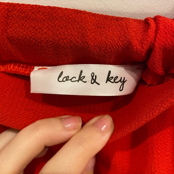 Small red flowy pants with bottom slit - Picture 2 of 3